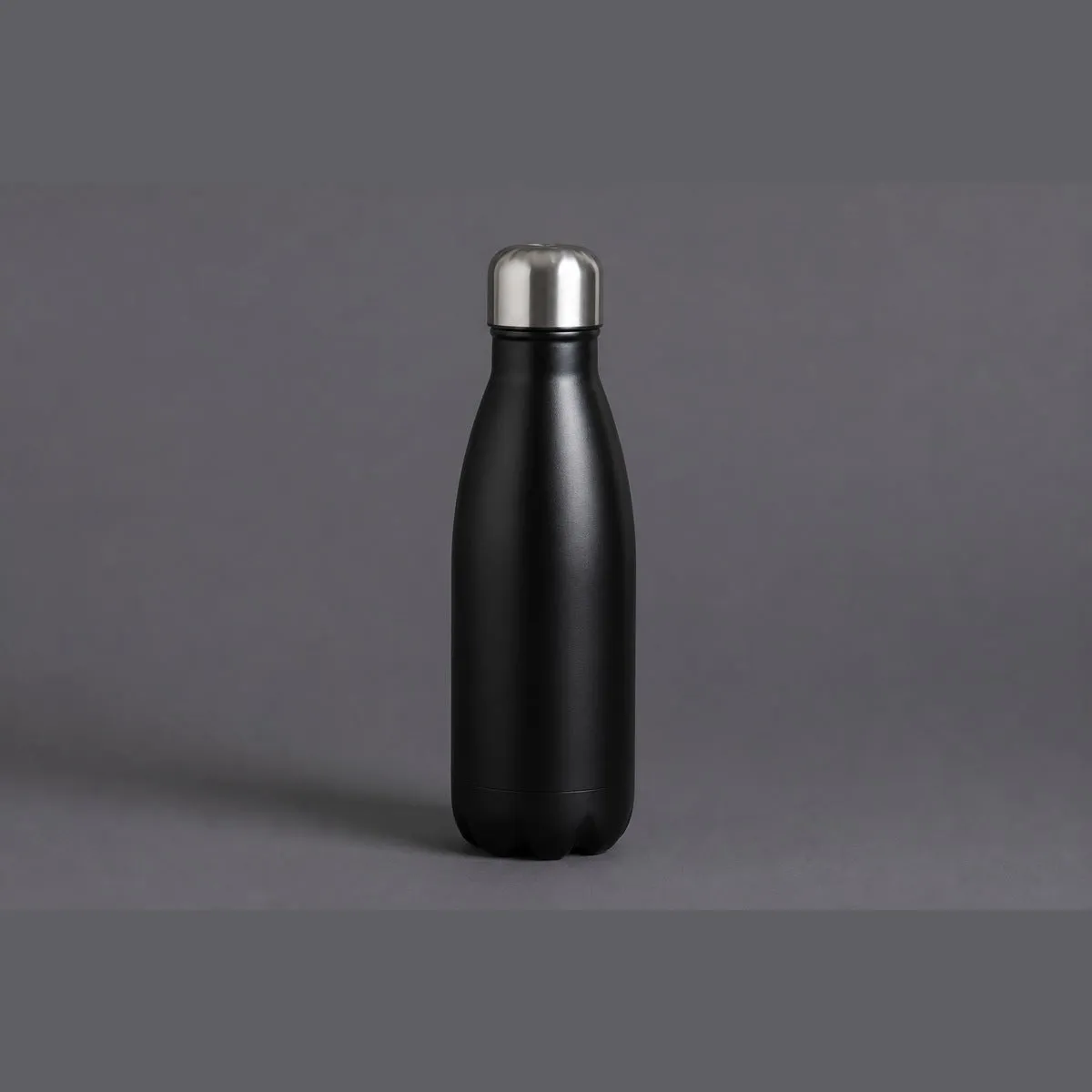 Stainless Bottle, 17 oz, matte black, on graphite